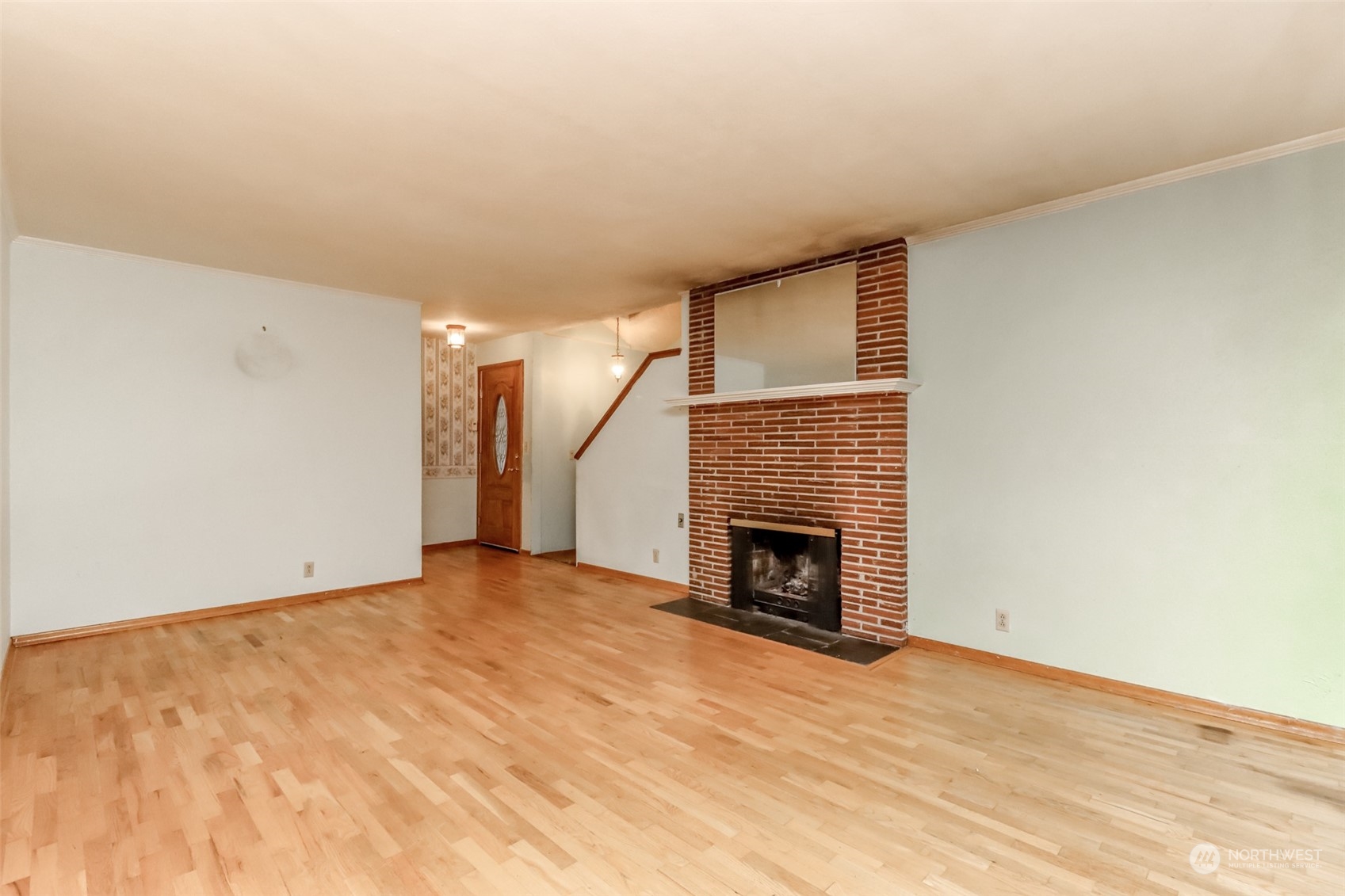 425 Ramsdell Street Fircrest, WA 98466 - Photo 3 of 39 a view of empty room with a fireplace