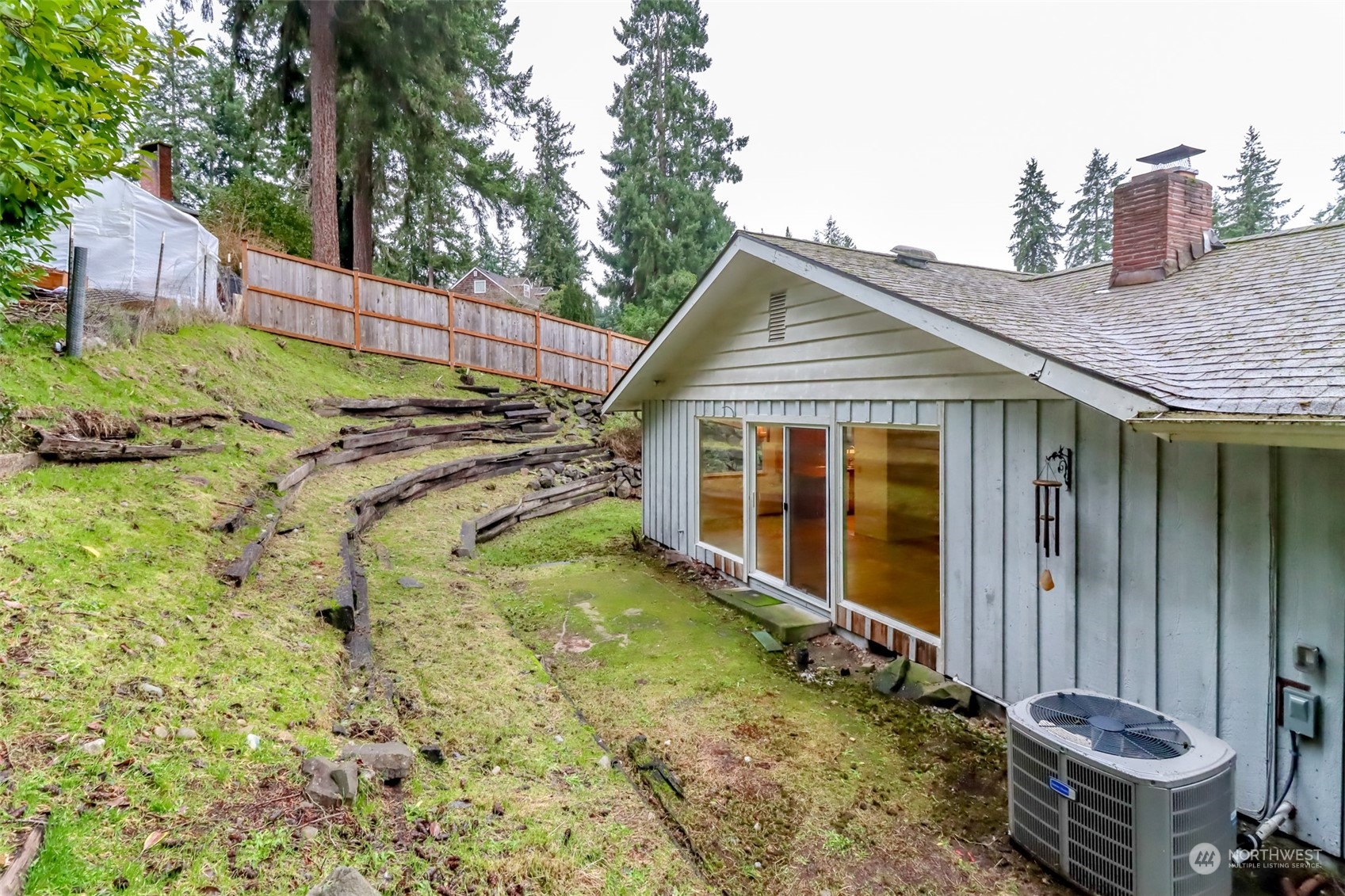 425 Ramsdell Street Fircrest, WA 98466 - Photo 32 of 39 a view of a house with backyard and sitting area