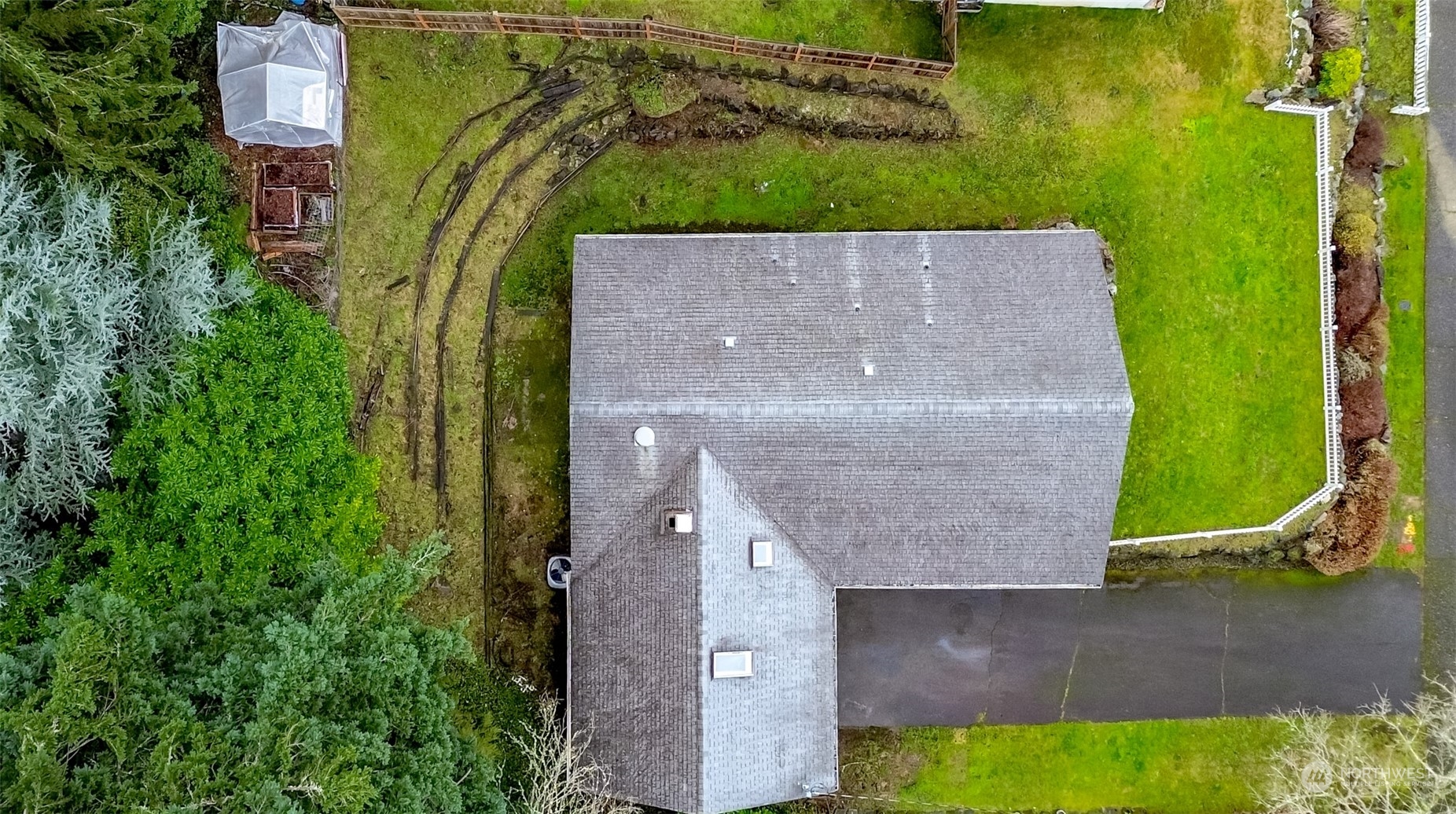 425 Ramsdell Street Fircrest, WA 98466 - Photo 33 of 39 an aerial view of a house with a yard