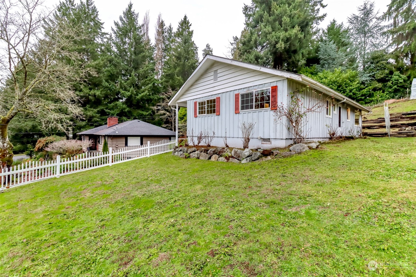 425 Ramsdell Street Fircrest, WA 98466 - Photo 34 of 39 a view of a house with a yard and sitting area