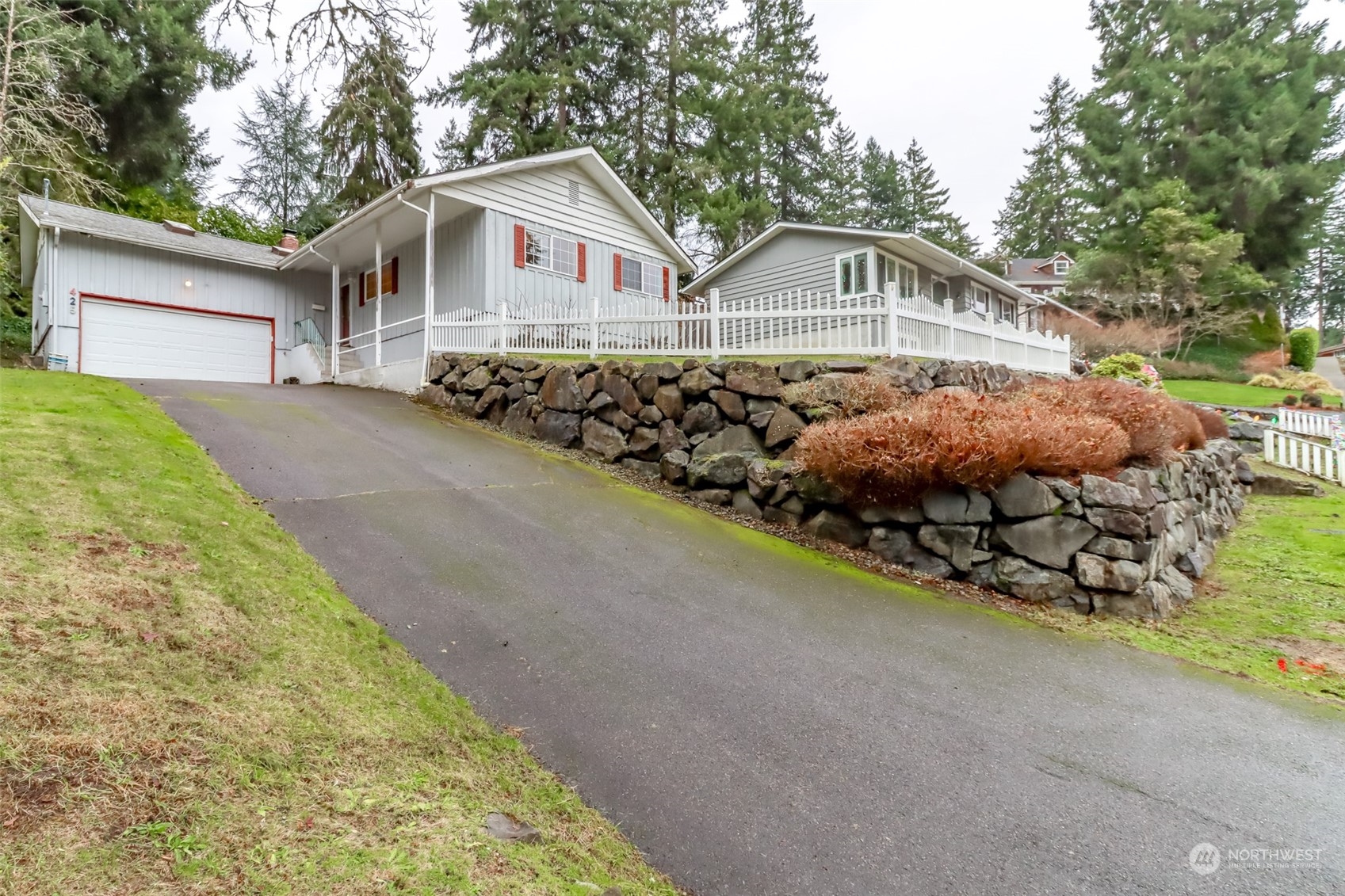 425 Ramsdell Street Fircrest, WA 98466 - Photo 37 of 39 a front view of a house with a yard and garage