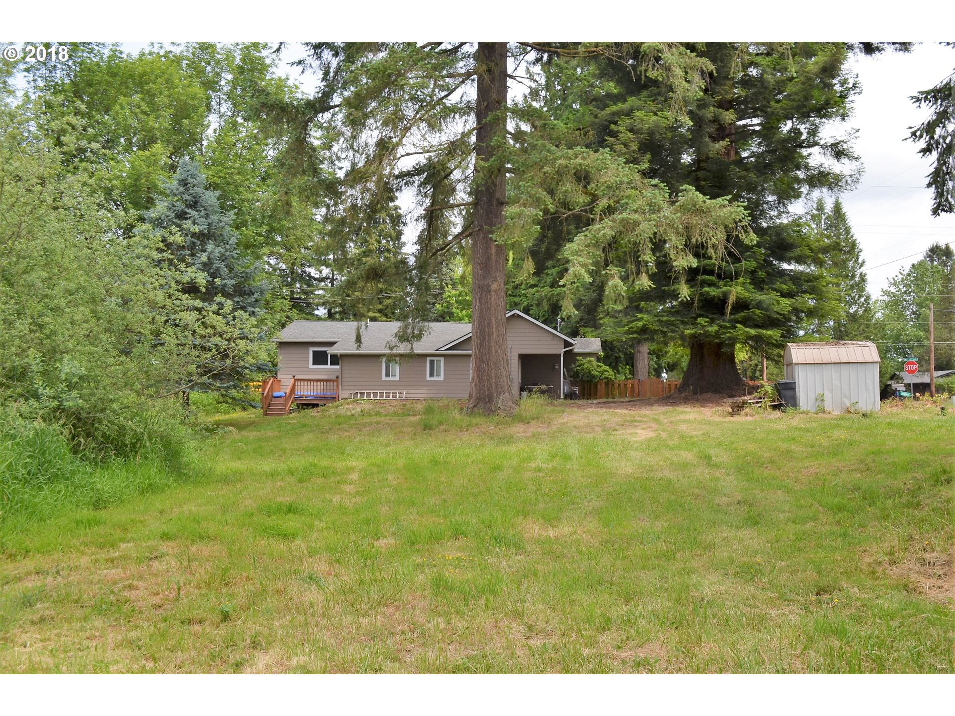 912 Northeast 194th Street Ridgefield, WA 98642 - Photo 23 of 29 a backyard of a house with table and chairs