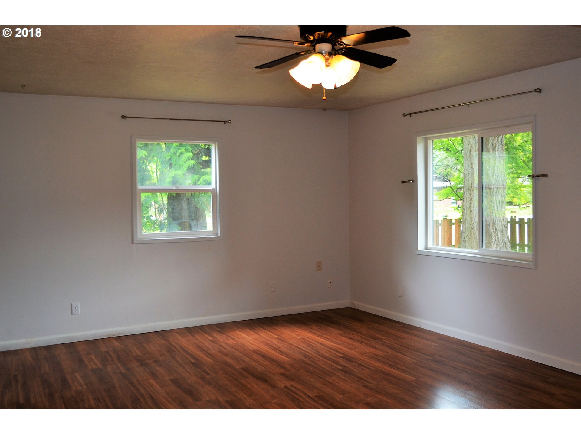 912 Northeast 194th Street Ridgefield, WA 98642 - Photo 5 of 29 a view of an empty room with a window