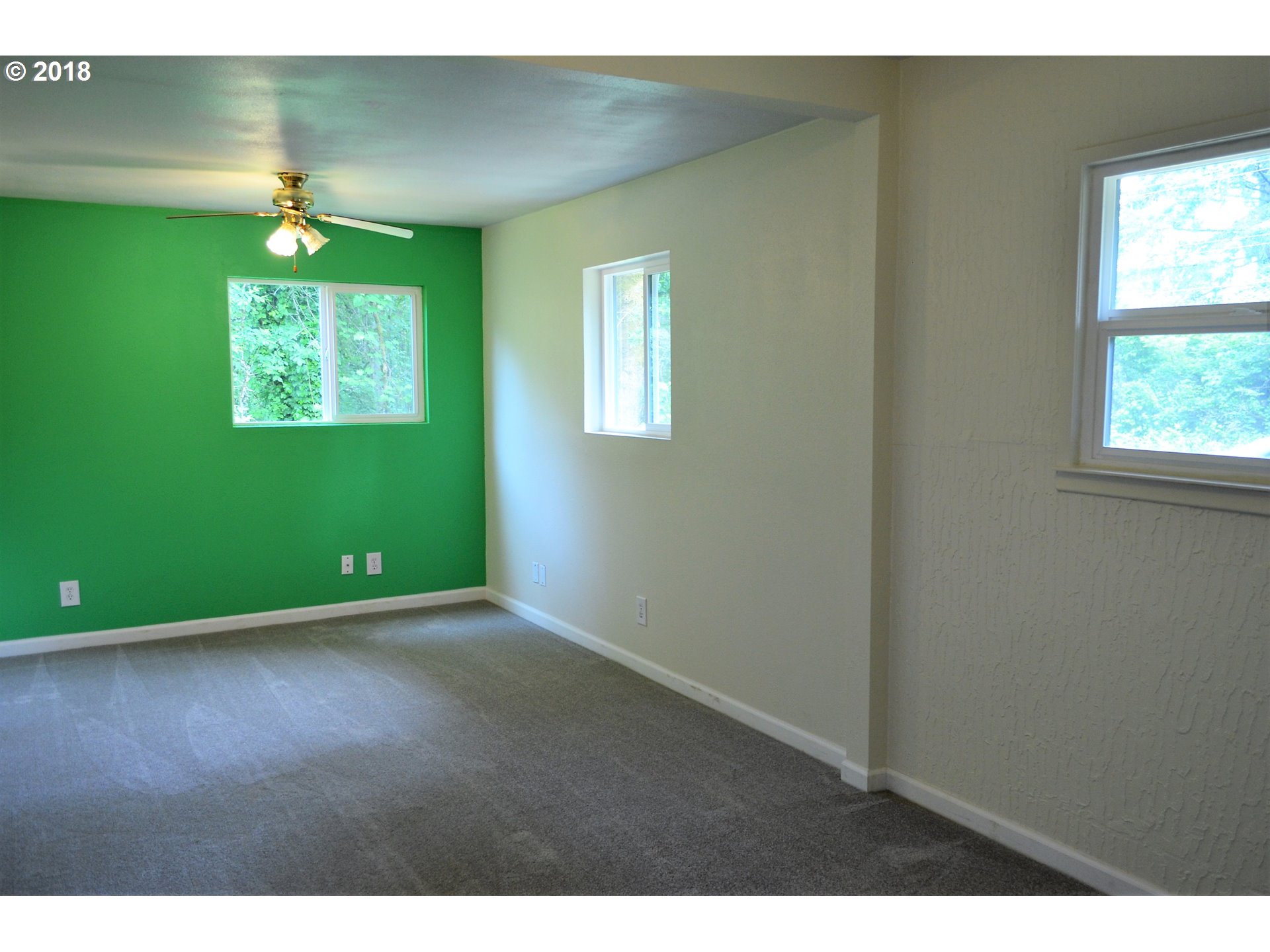 912 Northeast 194th Street Ridgefield, WA 98642 - Photo 6 of 29 a view of an empty room with a window