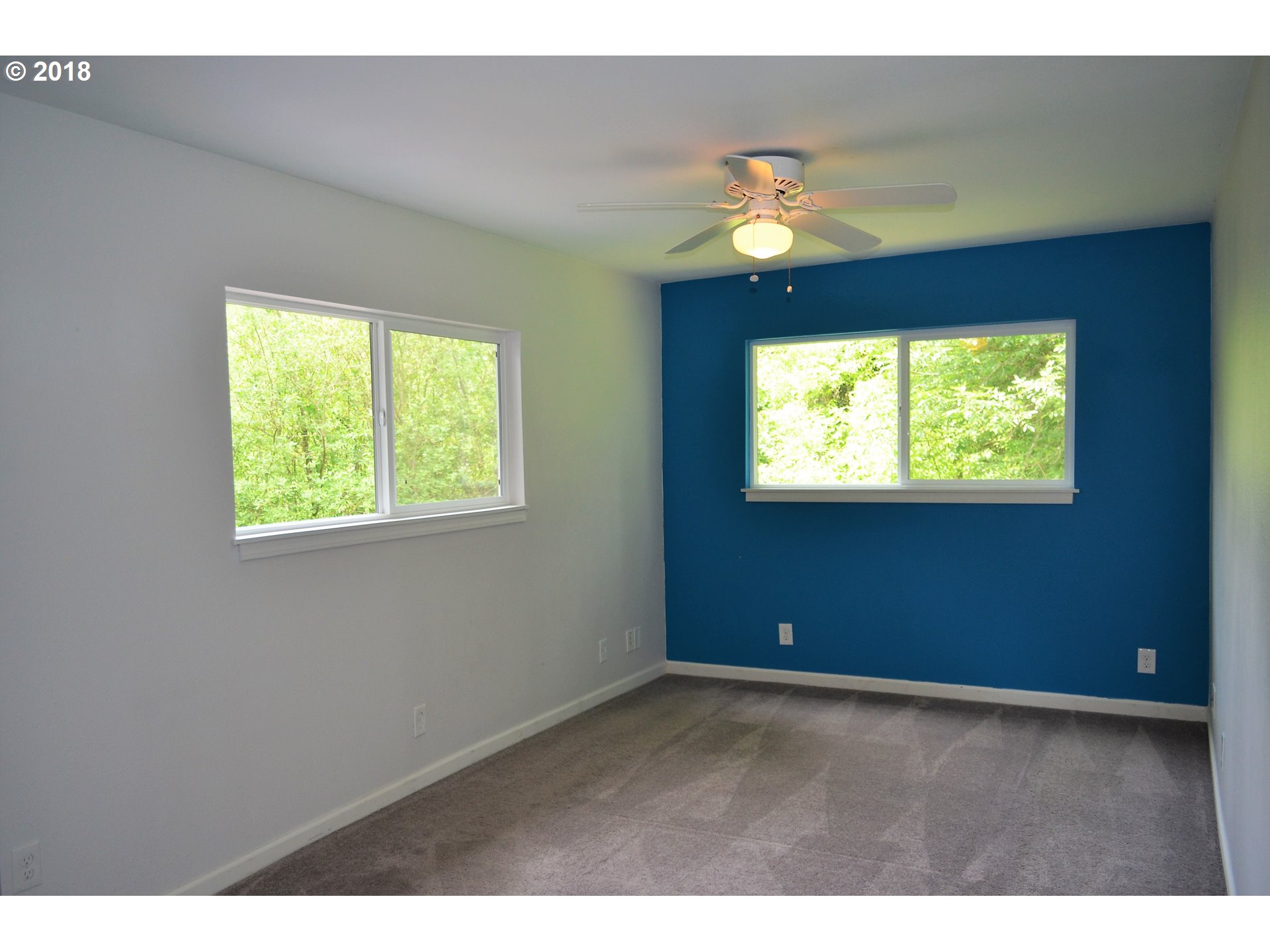 912 Northeast 194th Street Ridgefield, WA 98642 - Photo 7 of 29 a view of an empty room with a window