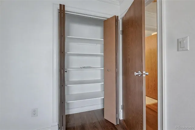 a view of bathroom with a tub and shower