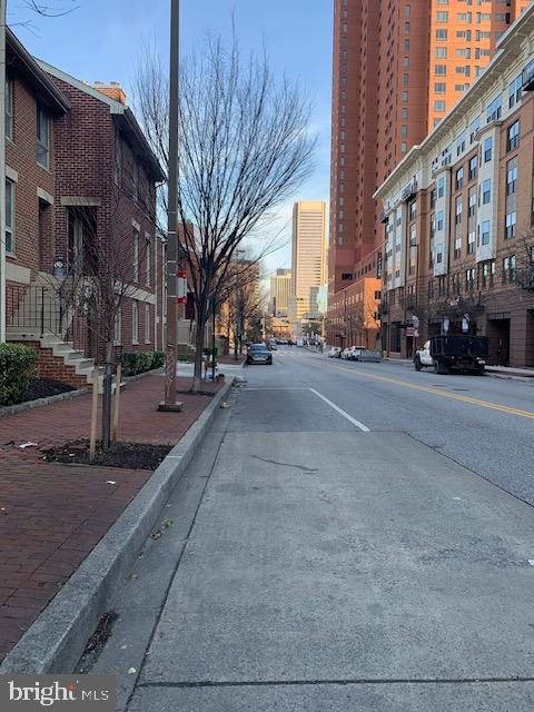 626 South Charles Street, Unit R 25 Baltimore, MD 21230 - Photo 2 of 17 a street with a building in the background
