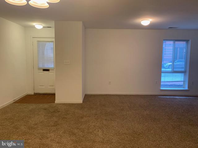 626 South Charles Street, Unit R 25 Baltimore, MD 21230 - Photo 3 of 17 an empty room with windows