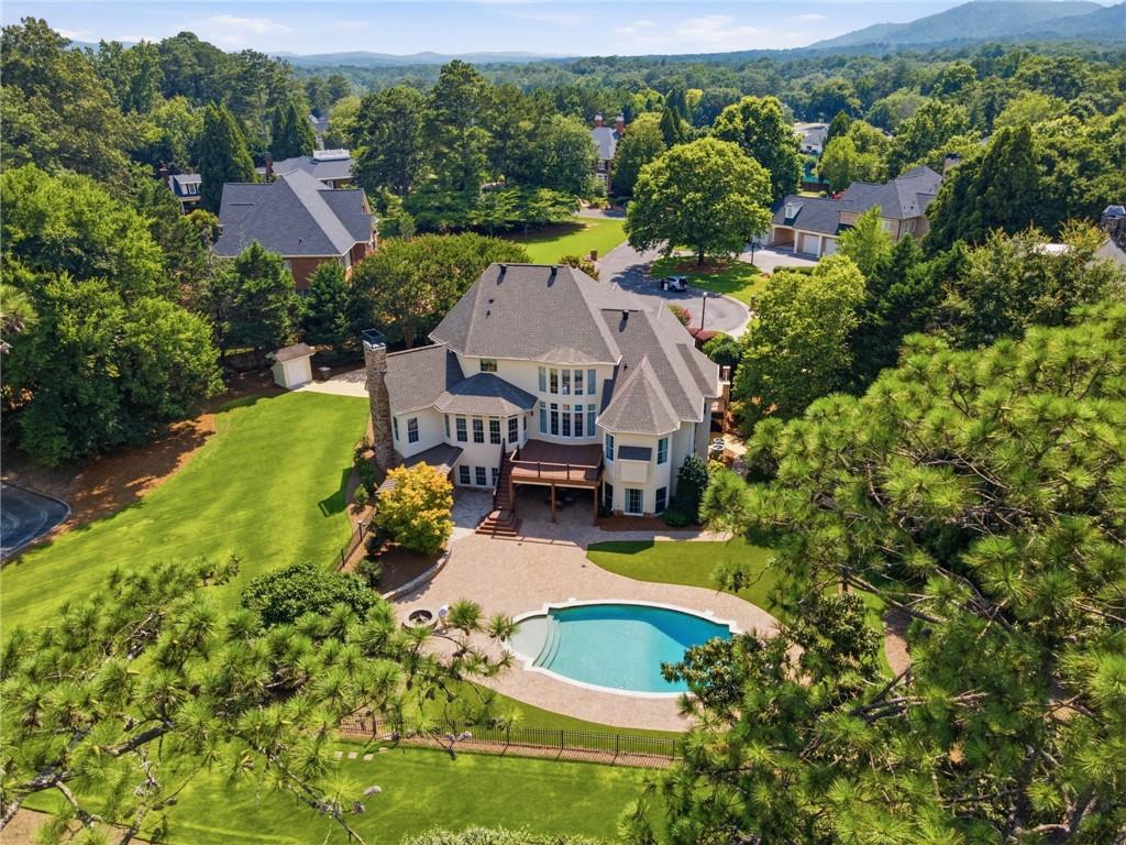 5 St Andrews Way Rome, GA 30165 - Photo 65 of 75 an aerial view of a house with swimming pool patio and outdoor seating