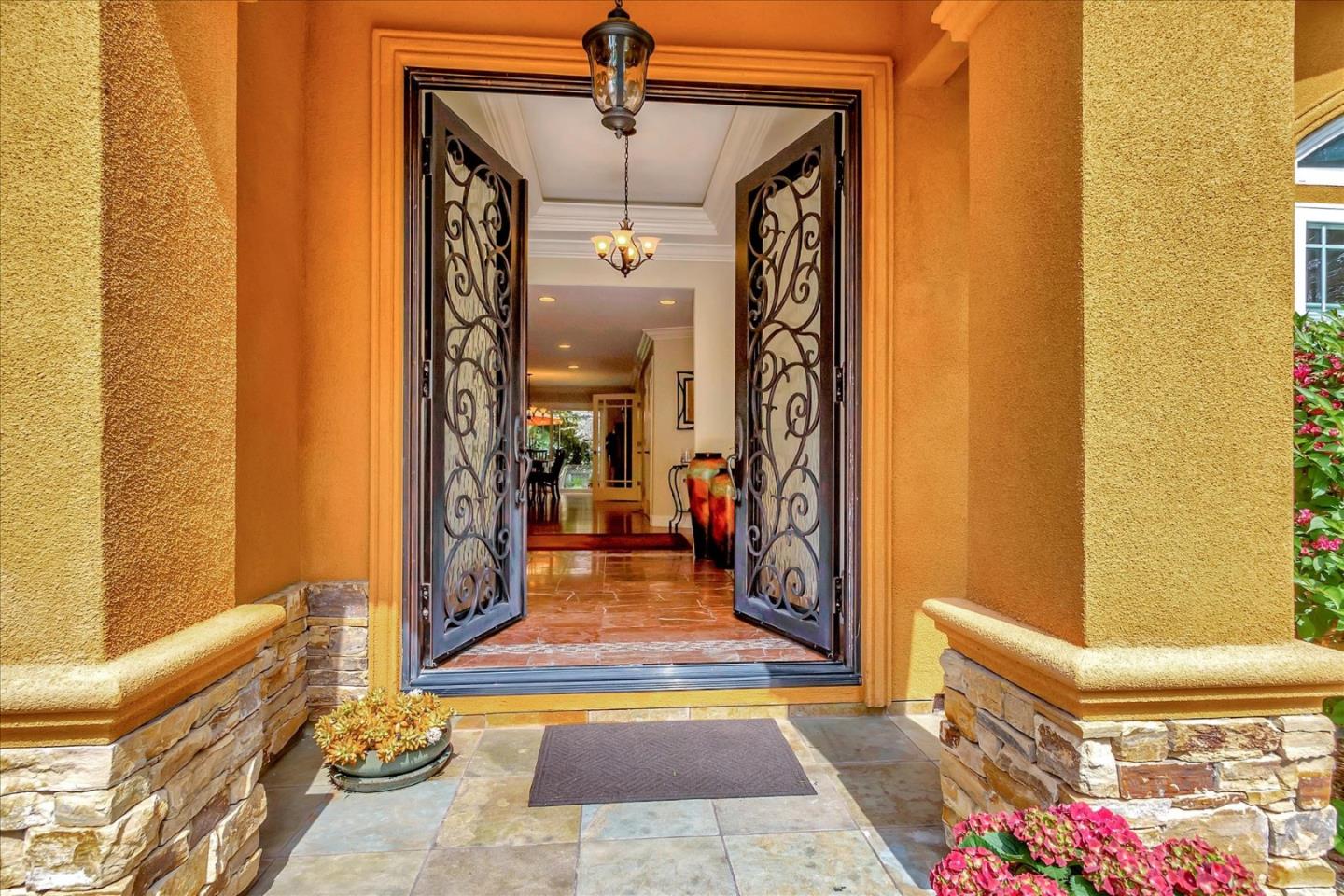 10181 Phar Lap Drive Cupertino, CA 95014 - Photo 2 of 9 a view of living room filled with furniture