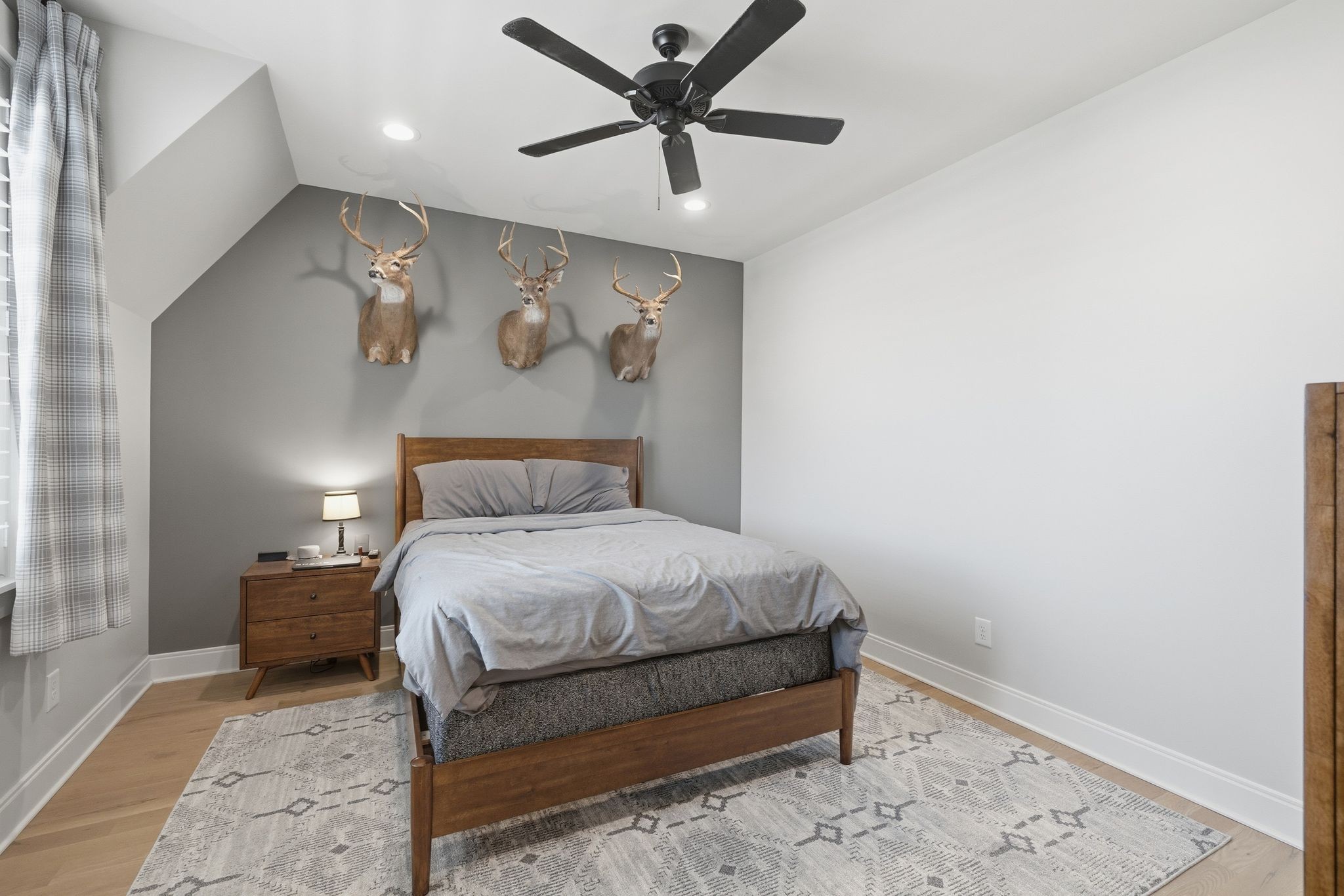 1733 Rigsby Avenue Murfreesboro, TN 37129 - Photo 36 of 57 a bedroom with a bed and a wall painting