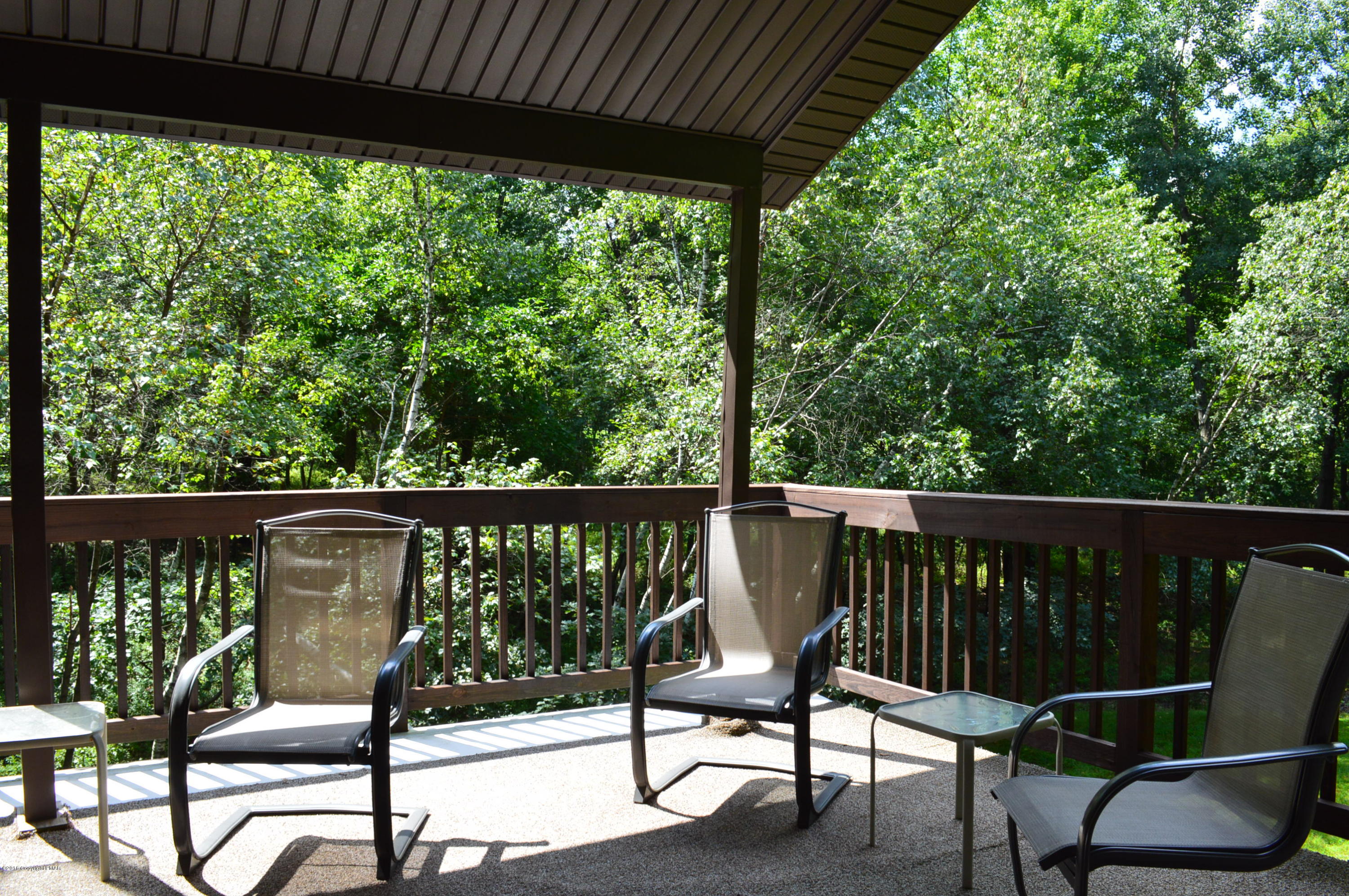 256 Fern Ridge Road Blakeslee, PA 18610 - Photo 11 of 27 a view of a two chairs in the balcony