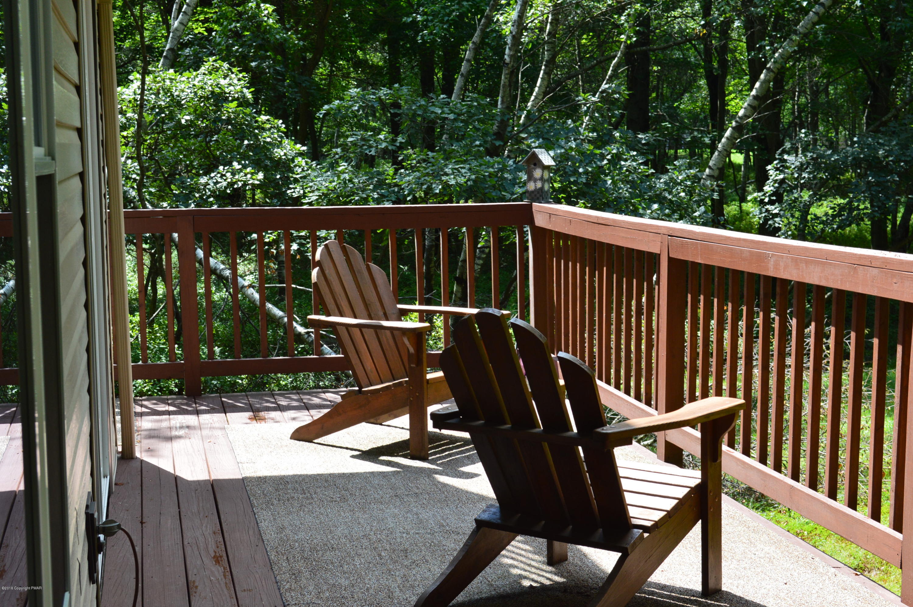 256 Fern Ridge Road Blakeslee, PA 18610 - Photo 5 of 27 a view of a wooden deck