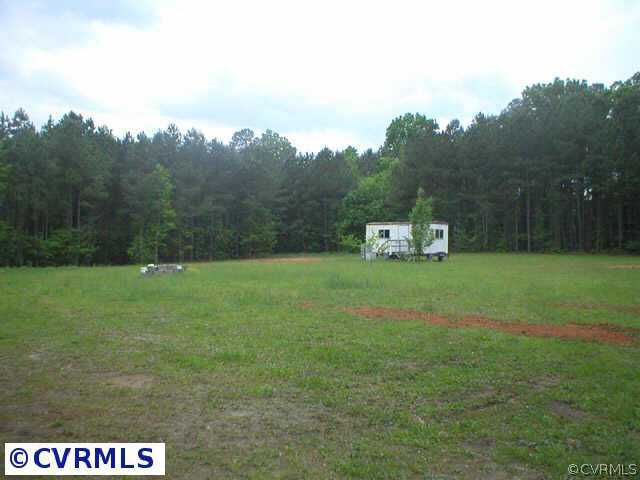 0 White Oak Road Ford, VA 23850 - Photo 1 of 2 a green field with trees in the background