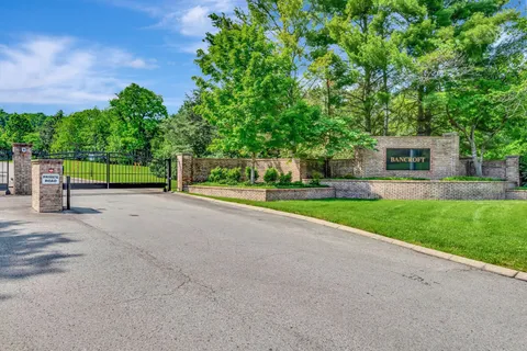 a view of a house with a big yard