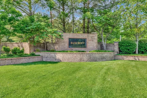 a view of a back yard with a house