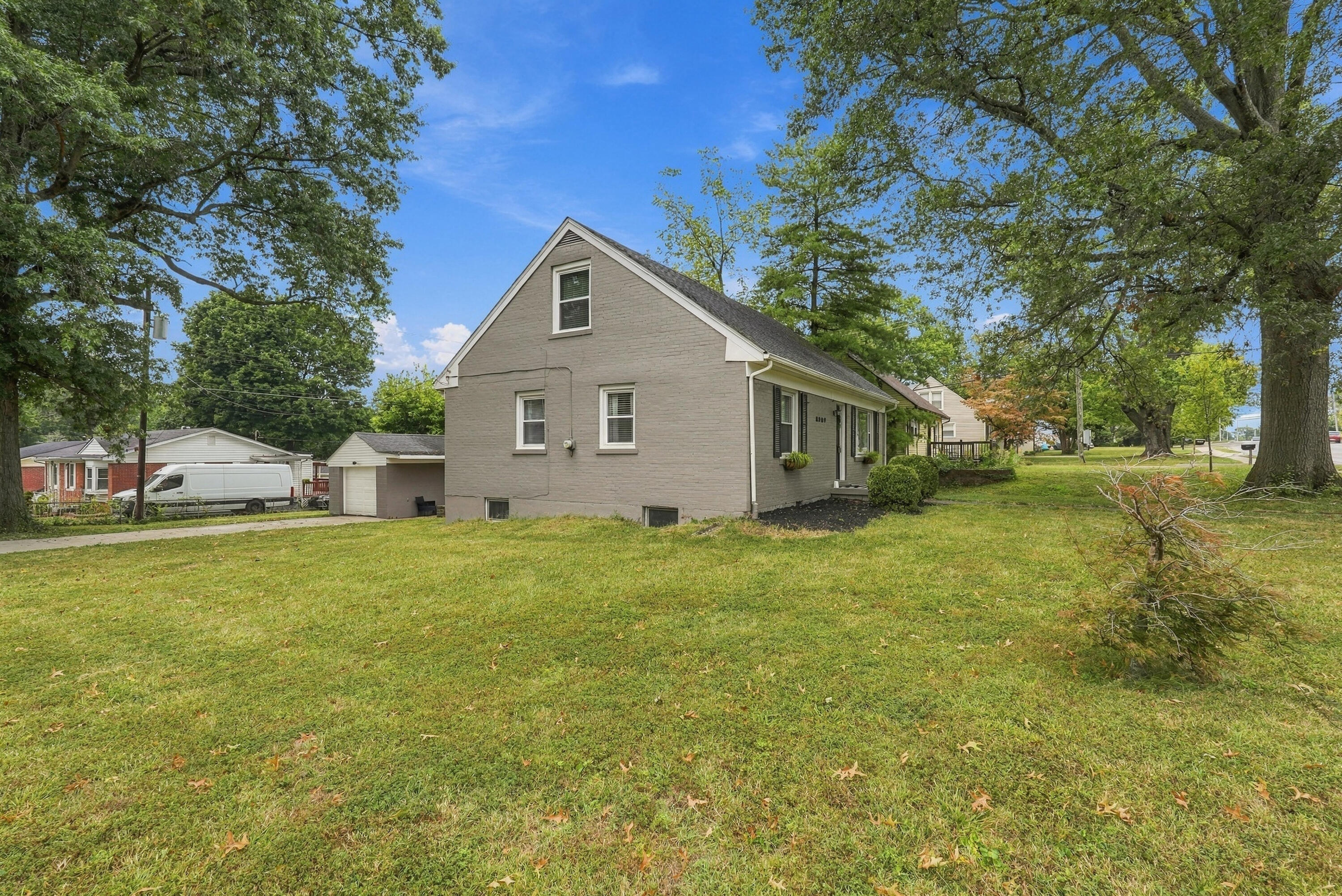 2909 Clays Mill Road Lexington, KY 40503 - Photo 5 of 46 This .25-acre corner lot offers a side-entry driveway and garage access from Nakomi Drive, along with a spacious backyard and large deck that provide plenty of space to enjoy the outdoors.