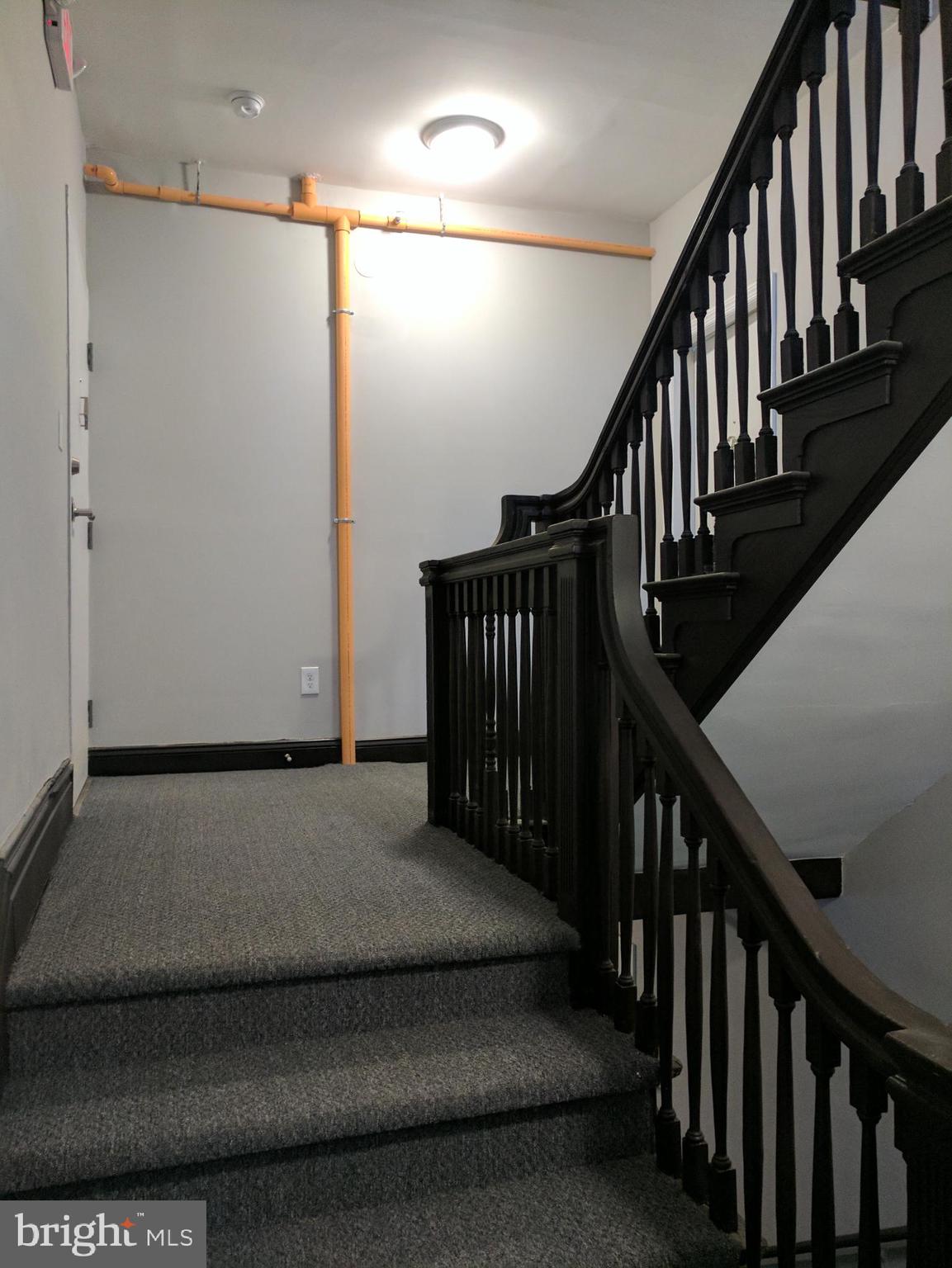 399 West State Street Trenton, NJ 08618 - Photo 13 of 28 a view of a hallway with staircase