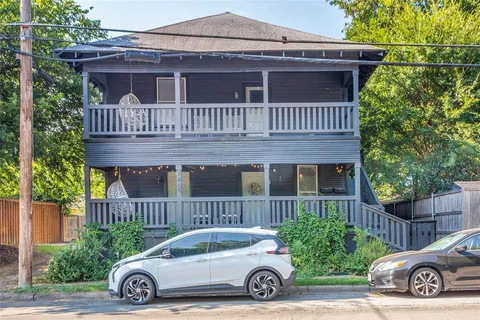 a car parked in front of a house