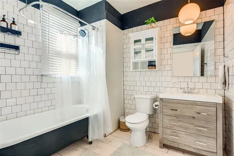 a room with water view and mountain view