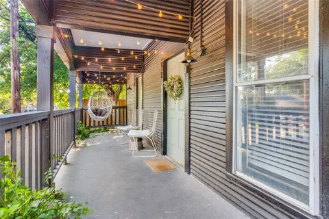 a view of swimming pool with a patio
