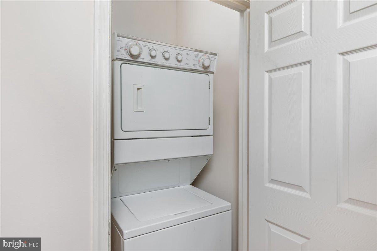 1705 Lake Shore Crest Drive, Unit 25 Reston, VA 20190 - Photo 18 of 31 a close up view of a washer and dryer