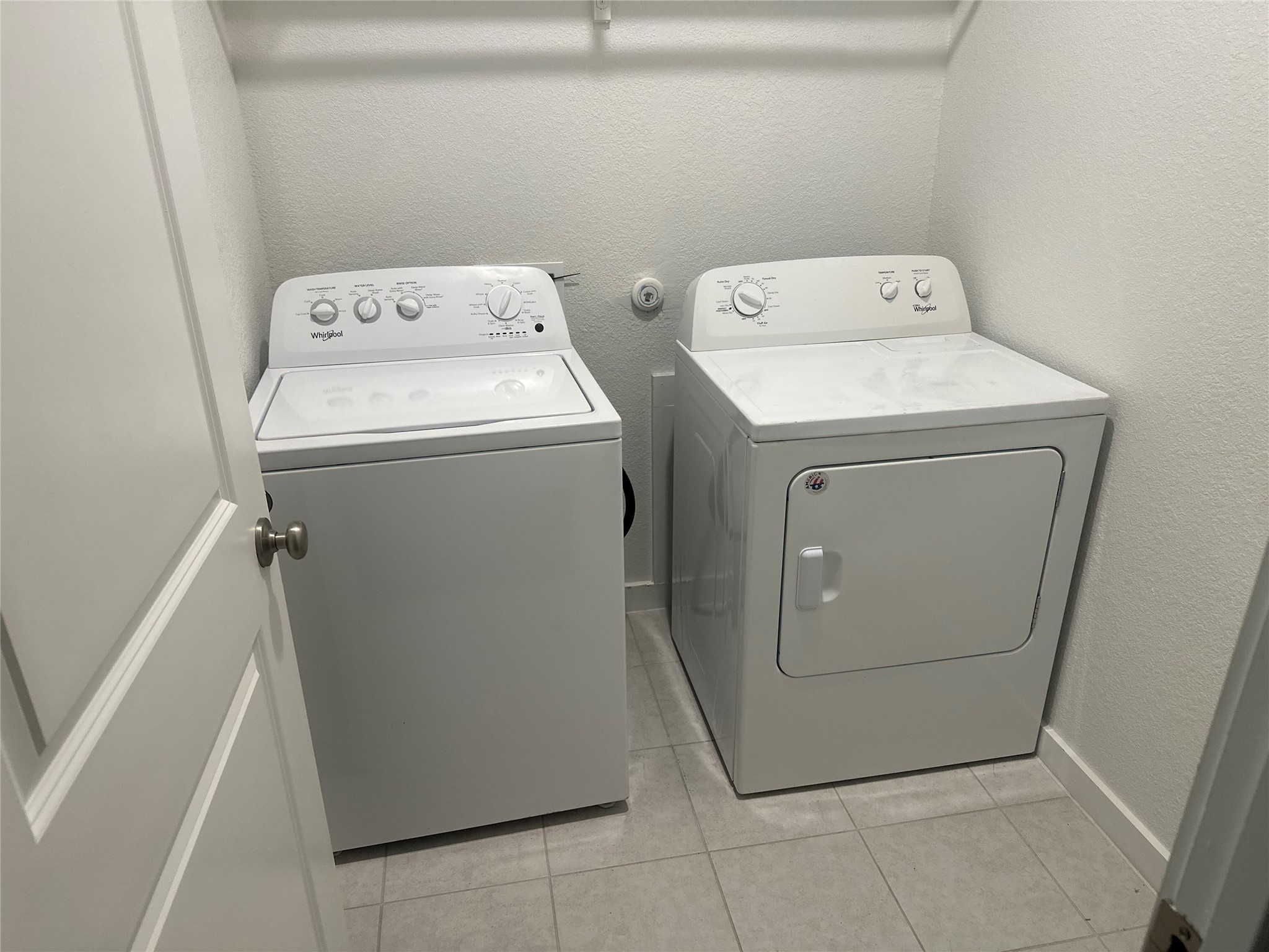 249 Heartleaf Road San Marcos, TX 78666 - Photo 30 of 38 a utility room with dryer and washer