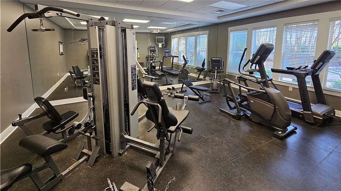 303 Lookover Drive Anderson, SC 29621 - Photo 45 of 46 This fitness room offers ample space for various exercise equipment, featuring large windows.