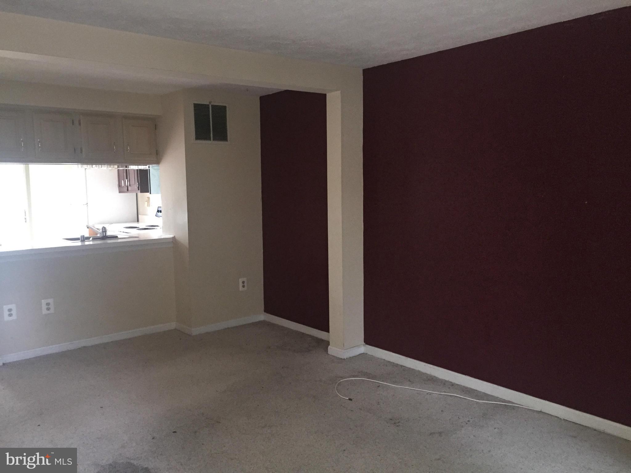 2211 Riding Crop Way Baltimore, MD 21244 - Photo 4 of 20 an empty room with a window