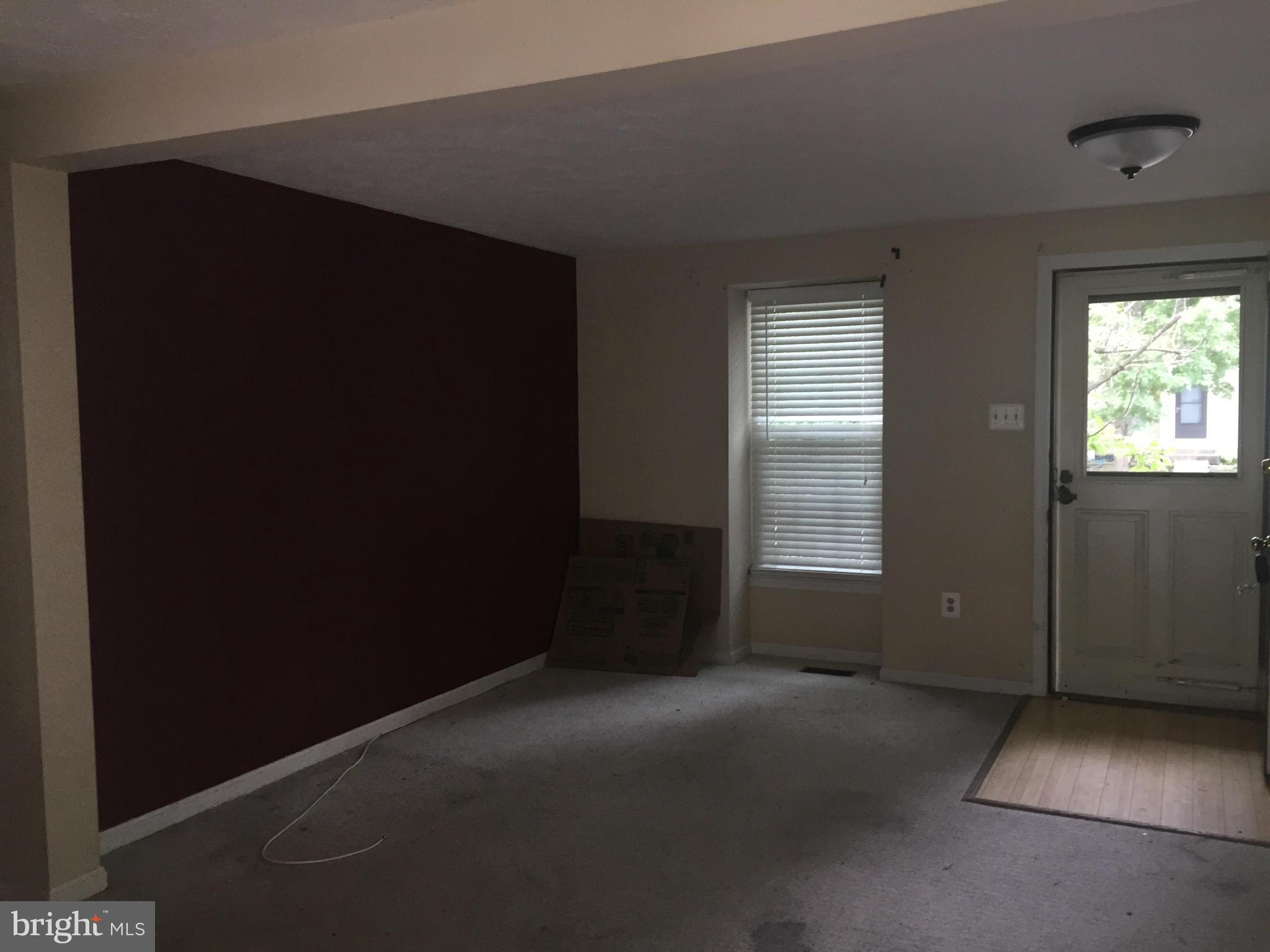 2211 Riding Crop Way Baltimore, MD 21244 - Photo 5 of 20 an empty room with windows