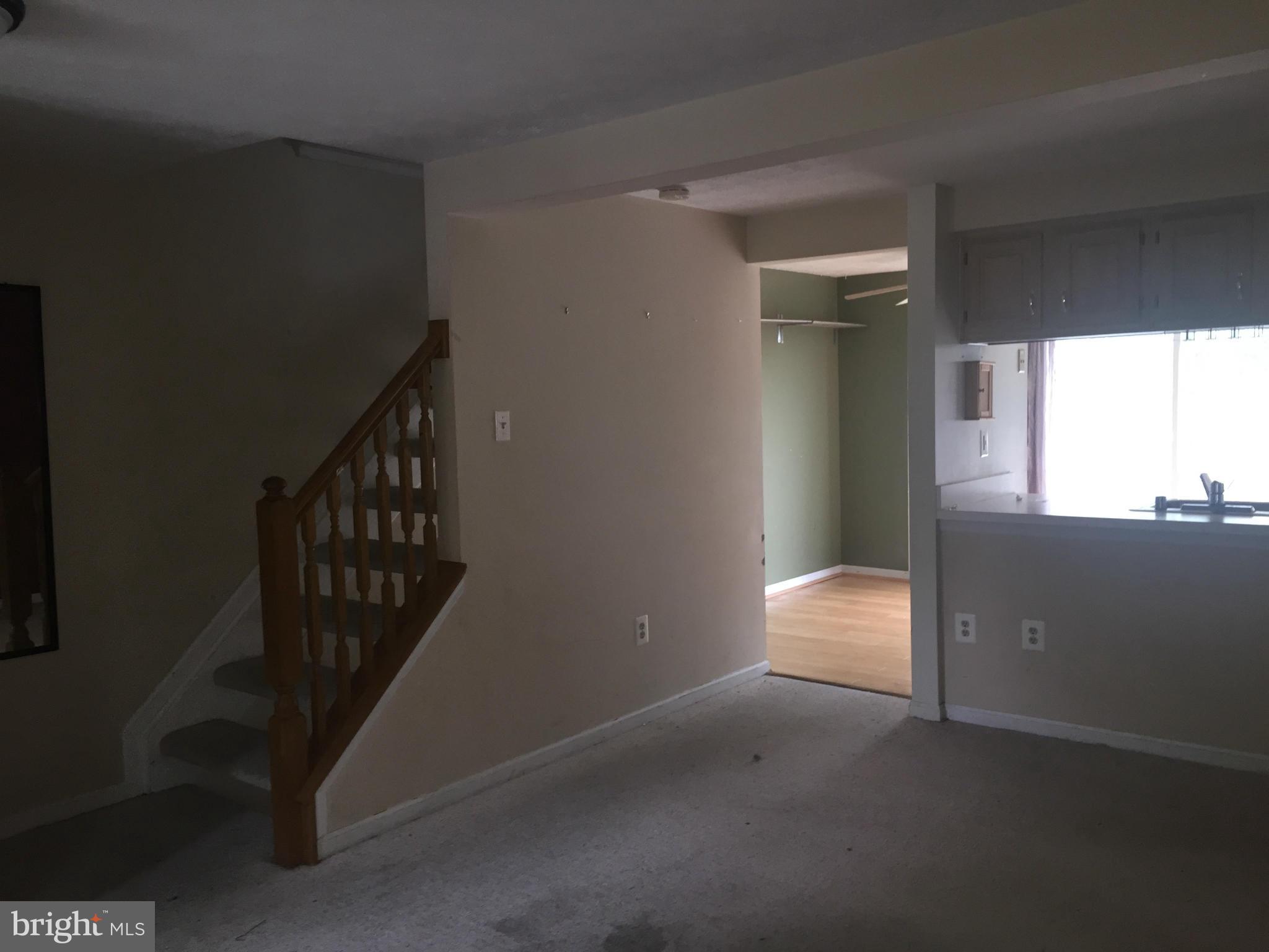 2211 Riding Crop Way Baltimore, MD 21244 - Photo 6 of 20 a view of an empty room with a window
