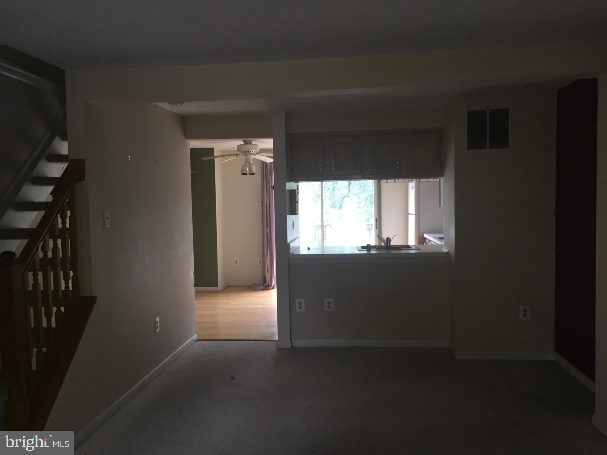 2211 Riding Crop Way Baltimore, MD 21244 - Photo 7 of 20 a view of an empty room with a window