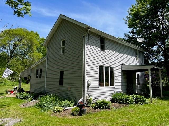 31 Schiestle Road Mercer, PA 16137 - Photo 1 of 22 a front view of a house with a yard