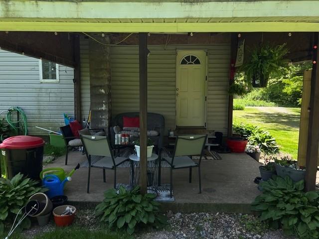 31 Schiestle Road Mercer, PA 16137 - Photo 3 of 22 an outdoor view of garden with patio