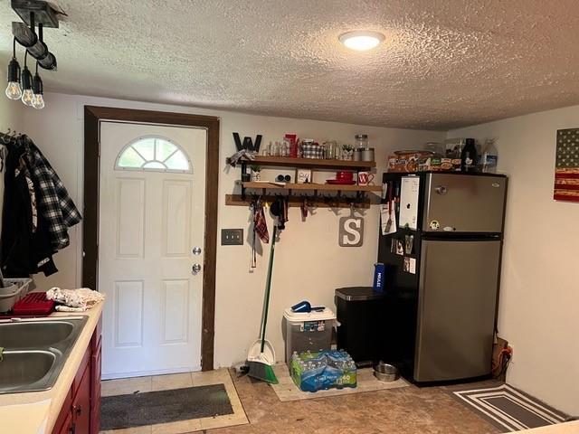 31 Schiestle Road Mercer, PA 16137 - Photo 8 of 22 a kitchen with a refrigerator and a stove