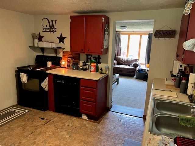 31 Schiestle Road Mercer, PA 16137 - Photo 10 of 22 a kitchen with a sink stove and cabinets