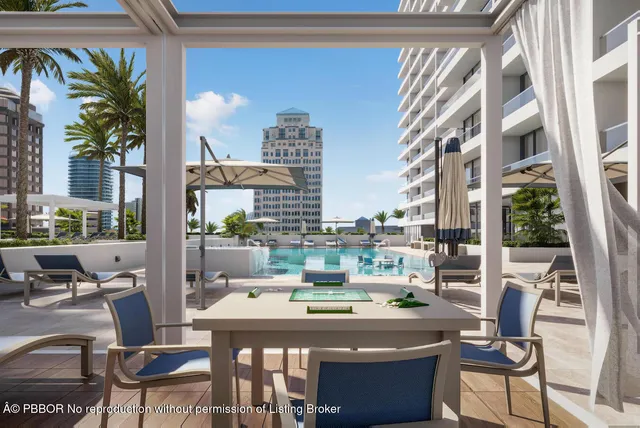 a view of a swimming pool with a patio