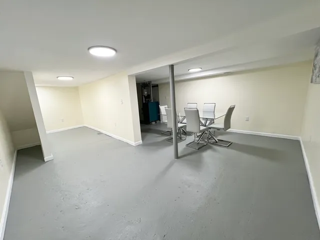 a view of a car parked in front of a house