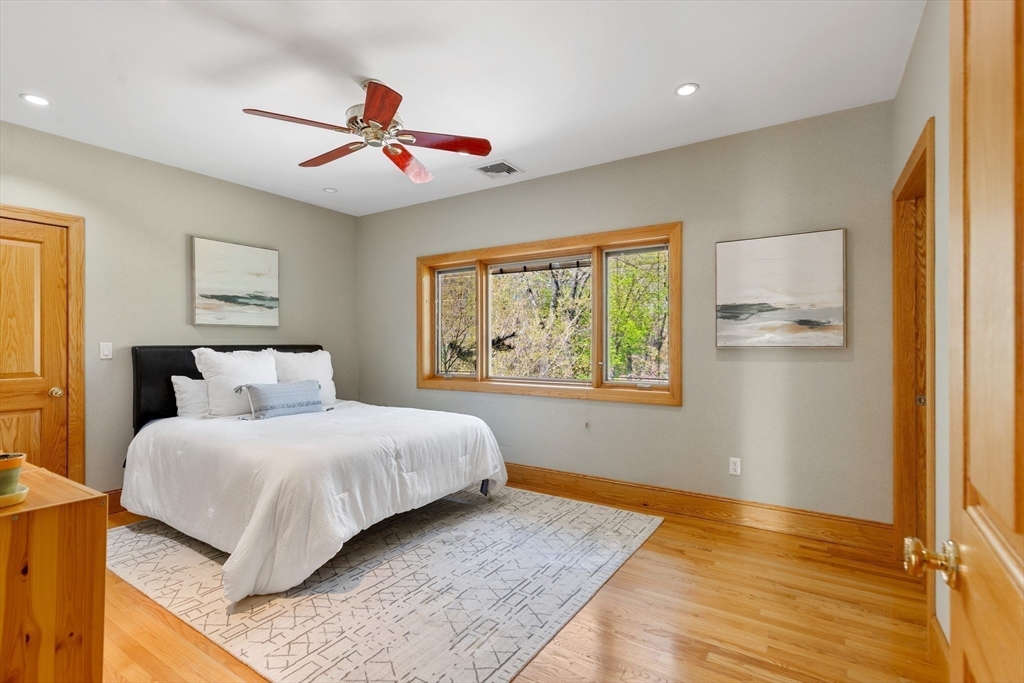 16 Solomon Pierce Road Lexington, MA 02420 - Photo 31 of 42 a bedroom with a bed and a window