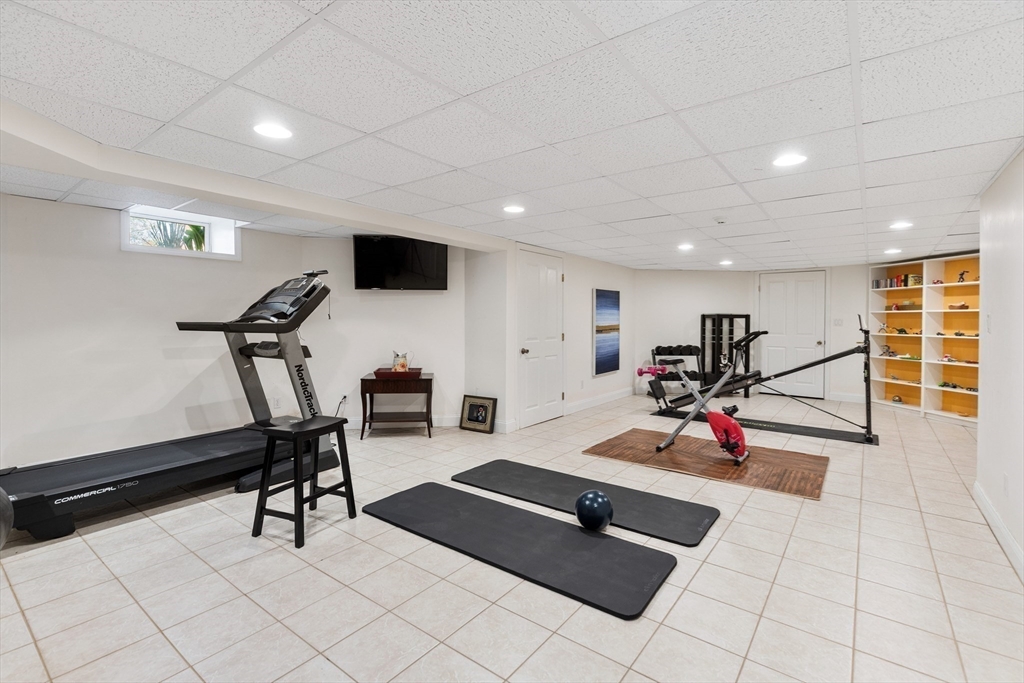 16 Solomon Pierce Road Lexington, MA 02420 - Photo 37 of 42 a view of a room with gym equipment