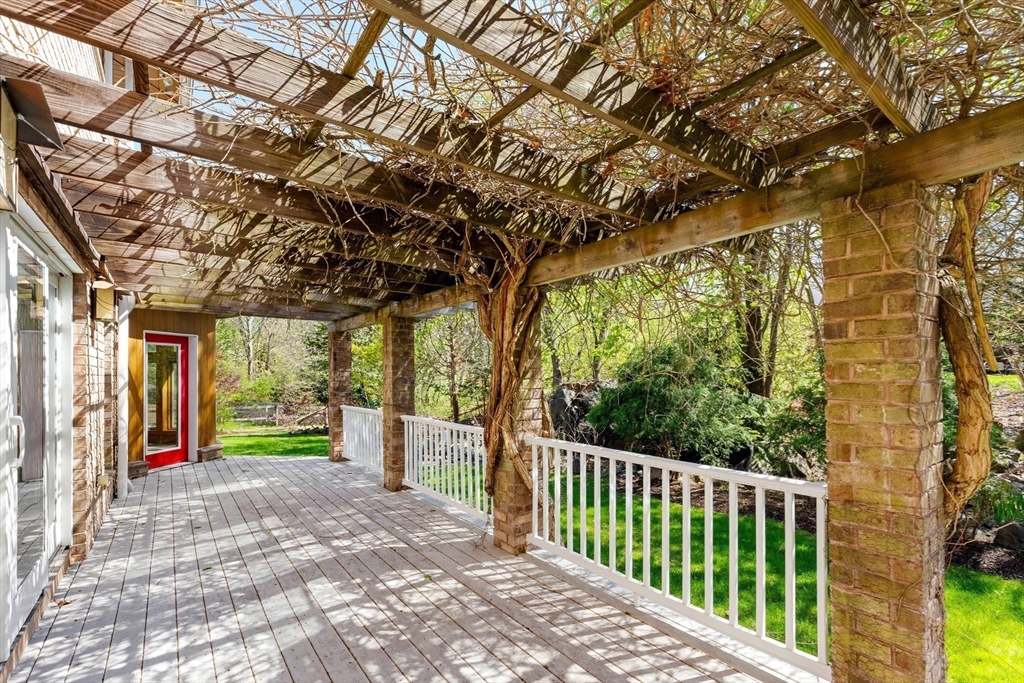 16 Solomon Pierce Road Lexington, MA 02420 - Photo 8 of 42 a view of a porch with a large tree