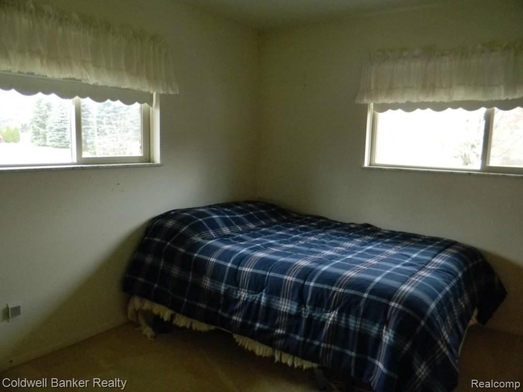 614 East Wardlow Road Highland, MI 48356 - Photo 12 of 21 Bedroom IV
