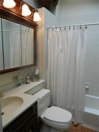 17 Sagamore Road Marblehead, MA 01945 - Photo 13 of 21 a bathroom with a granite countertop sink toilet and a mirror