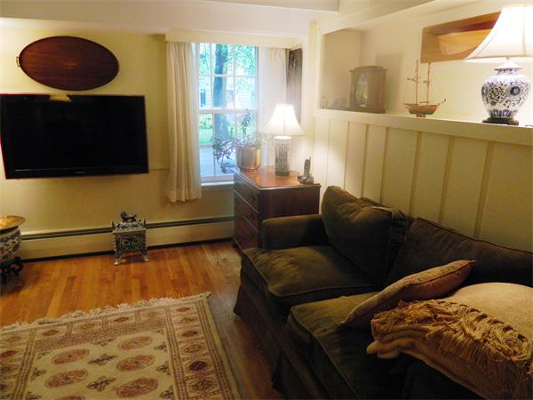 17 Sagamore Road Marblehead, MA 01945 - Photo 15 of 21 a living room with furniture and a flat screen tv