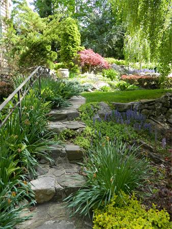 17 Sagamore Road Marblehead, MA 01945 - Photo 17 of 21 a backyard of a house with a yard and outdoor seating