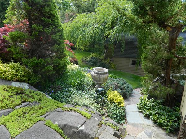 17 Sagamore Road Marblehead, MA 01945 - Photo 20 of 21 a view of a backyard with pathway