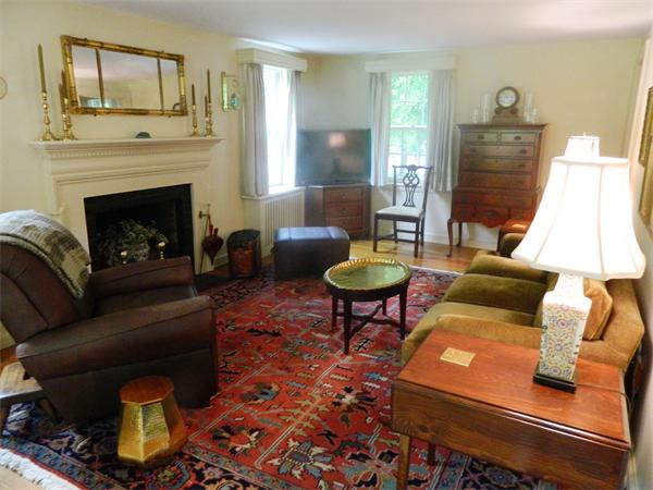 17 Sagamore Road Marblehead, MA 01945 - Photo 3 of 21 a living room with furniture and a fireplace