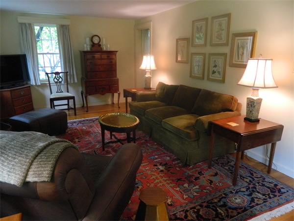 17 Sagamore Road Marblehead, MA 01945 - Photo 4 of 21 a living room with furniture a lamp and a flat screen tv