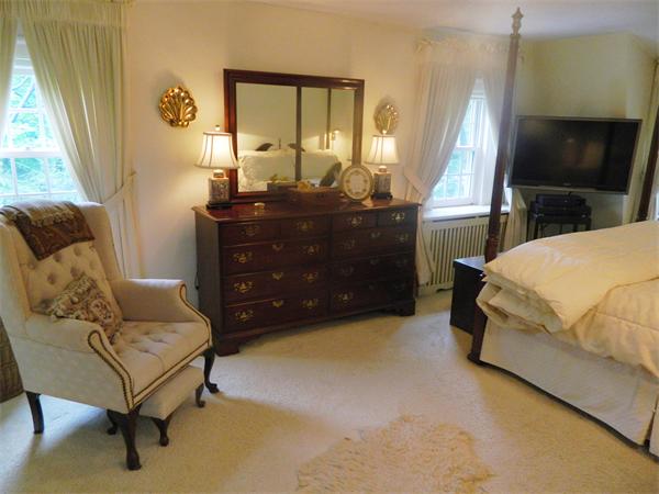 17 Sagamore Road Marblehead, MA 01945 - Photo 10 of 21 a bedroom with a bed and a television