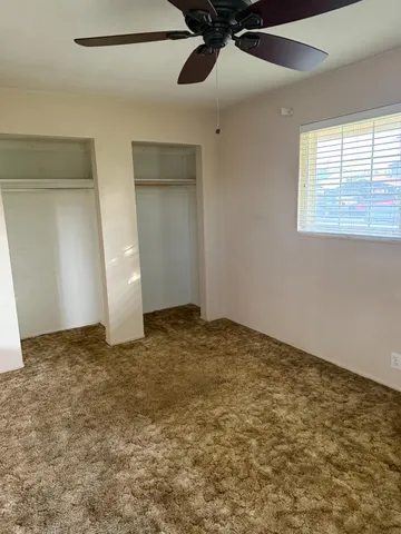 a bathroom with a bath tub and a window